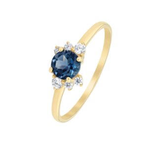 Bague or jaune, topaze "bleu London" 0.55 carat et zirconiums